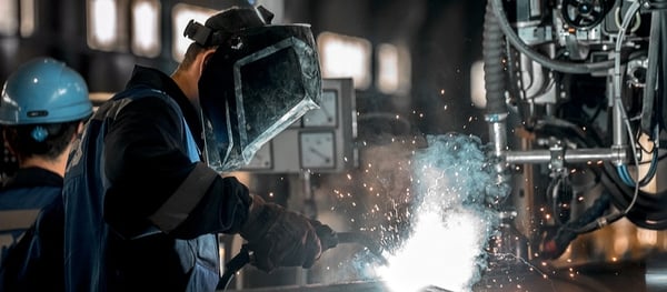 Welder In Manufacturing Plant