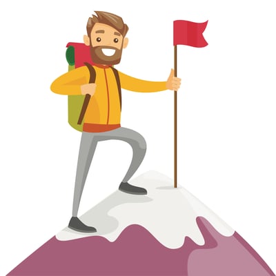 Man top of mountain