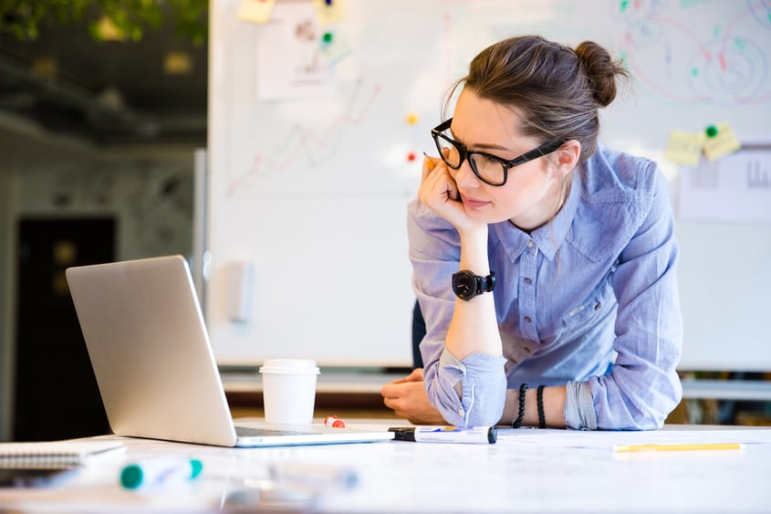 Young female industrial marketer in the office