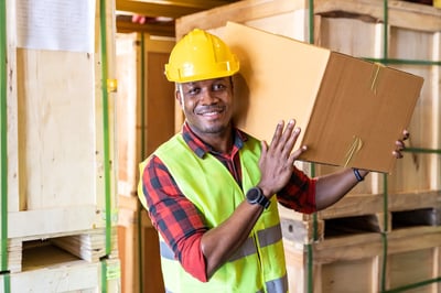 Smiling African American warehouse worker